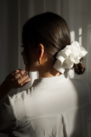 Szycie ze skrawkow z sukni ślubnej